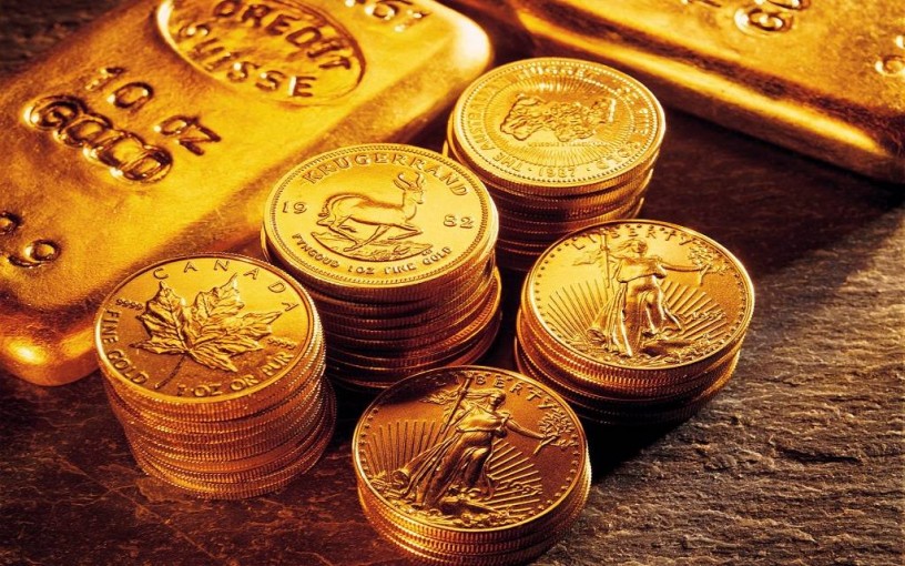 الذهب يرتفع عند التسوية مع خسائر الدولار