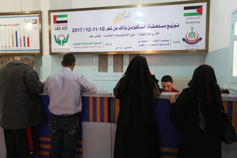 المجلس العلمي يشرع بصرف الكفالات للأسر ذوي الاحتباجات