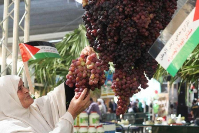 بنك الاسكان يساهم في رعاية مهرجان العنب الفلسطيني 2018 
