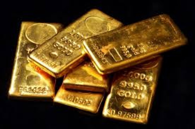 الذهب يهبط ويحوم قرب أعلى مستوى في 10 أسابيع