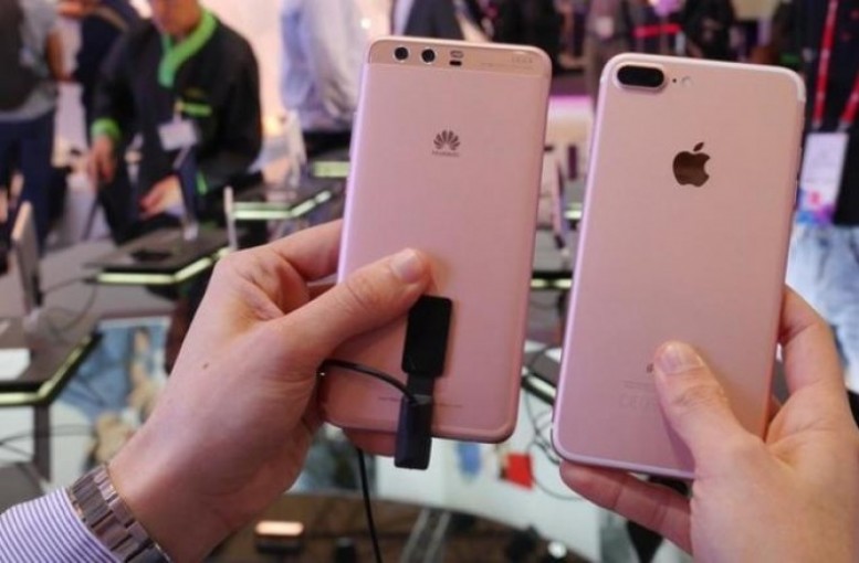 معركة شرسة بين هواوي وآبل.. من يفوز؟