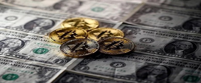 العملة الرقمية بتكوين تسجل 5 آلاف دولار لفترة وجيزة بعد زيادة 20%