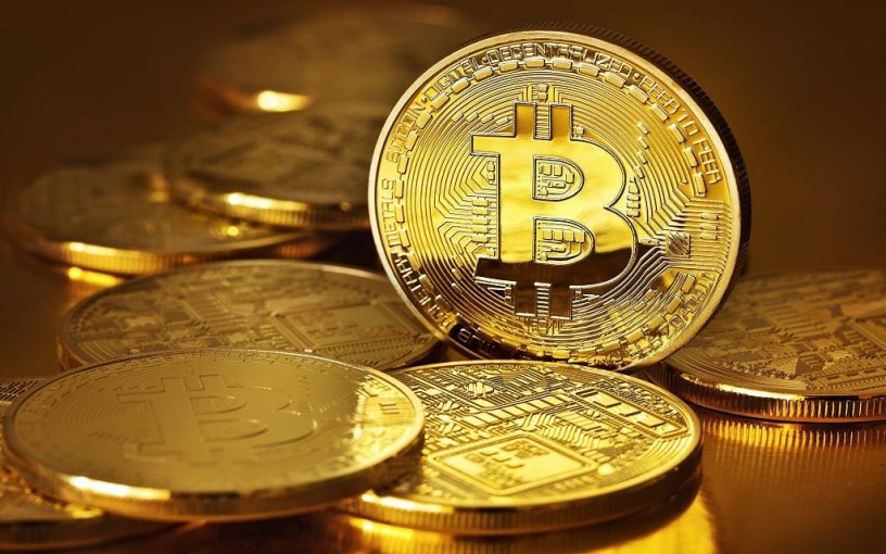 البيتكوين تتراجع لكنها لا تزال أعلى مستوى 9 آلاف دولار
